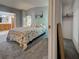 Bedroom showing bed, closet, and doorway to bath area at 6562 Hikina Dr, North Port, FL 34287