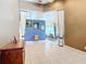 Elegant foyer with high ceilings, stylish decor, and spacious entryway at 6594 Buckboard St, North Port, FL 34291