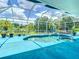 Inviting screened pool area perfect for relaxation, featuring spacious deck and serene outdoor views at 6594 Buckboard St, North Port, FL 34291