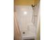 Bathroom with a modern walk-in shower featuring a built-in seat and handheld shower head at 724 Hartford Nw Dr, Port Charlotte, FL 33952