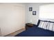 This bedroom has a cozy bed, a closet and artwork creating a relaxing space at 724 Hartford Nw Dr, Port Charlotte, FL 33952