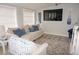 Relaxing living room with comfortable seating, a coastal theme, and plenty of natural light at 724 Hartford Nw Dr, Port Charlotte, FL 33952