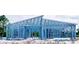 Metal framework for new home with modern design against bright cloudy skies at 105 Heather St, Port Charlotte, FL 33953
