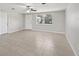 Bright living room with tile floors and lots of natural light at 1107 Seneca Rd, Venice, FL 34293