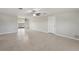 Open-concept living space showcasing bright tile floors, a ceiling fan, and a seamless flow for Gathering gatherings at 1107 Seneca Rd, Venice, FL 34293