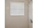 Bathroom shower with tiled walls, a window, and modern fixtures at 1107 Seneca Rd, Venice, FL 34293