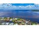 Breathtaking aerial view of the waterfront neighborhood with stunning water views at 119 Creek Se Dr, Port Charlotte, FL 33952
