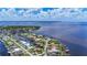 Canal homes offer deep water access, private boat lifts, and waterfront lifestyle at 119 Creek Se Dr, Port Charlotte, FL 33952