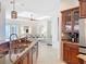Open concept kitchen features stainless steel appliances and seamless access to the living area at 119 Creek Se Dr, Port Charlotte, FL 33952