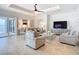 Bright living room features tile flooring, and water views at 119 Creek Se Dr, Port Charlotte, FL 33952