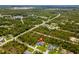 This home is surrounded by lush greenery in a tranquil neighborhood with lakes nearby at 12300 El Prado Dr, Punta Gorda, FL 33955