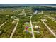 Beautiful home nestled amongst mature trees in a quiet neighborhood near a pristine lake at 12300 El Prado Dr, Punta Gorda, FL 33955