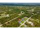 This home is in a lush green area and offers a peaceful, private setting at 12300 El Prado Dr, Punta Gorda, FL 33955