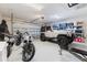 Spacious garage with ample storage and parking space for vehicles and equipment at 12300 El Prado Dr, Punta Gorda, FL 33955