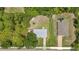 Aerial view of a single-Gathering home showcasing the lot and adjacent properties at 1242 Orlando Blvd, Port Charlotte, FL 33952
