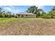 Expansive backyard with well-maintained lawn at 1242 Orlando Blvd, Port Charlotte, FL 33952