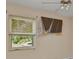 Bedroom with large window offering a view of the lush greenery at 1242 Orlando Blvd, Port Charlotte, FL 33952