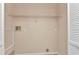 Neat laundry area with utility connections and a shelf at 1242 Orlando Blvd, Port Charlotte, FL 33952