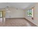 Well-lit living room showcasing tile floors, natural light, and an airy atmosphere at 1242 Orlando Blvd, Port Charlotte, FL 33952