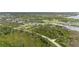 Scenic aerial view showcasing land and its proximity to the water at 12581 Eisenhower Dr, Port Charlotte, FL 33953