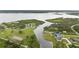 An aerial view capturing waterfront community at 12581 Eisenhower Dr, Port Charlotte, FL 33953