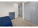 This bedroom features carpet, a closet, and a blue dresser at 12581 Eisenhower Dr, Port Charlotte, FL 33953