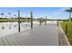 A spacious wooden dock with sturdy pilings, perfect for boating, fishing, and enjoying waterfront activities at 12581 Eisenhower Dr, Port Charlotte, FL 33953