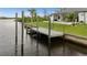Private dock providing direct access to the water, great for boating and recreation at 12581 Eisenhower Dr, Port Charlotte, FL 33953