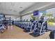 A fitness center featuring a variety of treadmills, fitness machines and big windows with exterior views at 13136 N Marsh Dr, Port Charlotte, FL 33953