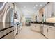 Bright, spacious kitchen with stainless steel appliances, granite countertops, and ample cabinet space at 13136 N Marsh Dr, Port Charlotte, FL 33953