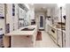 Efficient kitchen featuring white appliances, ample counter space, and a convenient layout for easy meal preparation at 1389 Hinton St, Port Charlotte, FL 33952
