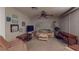 Comfortable living room featuring a large television, relaxing decor, and cozy seating, perfect for Gathering gatherings at 1389 Hinton St, Port Charlotte, FL 33952