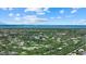 Aerial view showing the area's vast and well-planned residential community near the bay at 14166 Fort Worth Cir, Port Charlotte, FL 33981