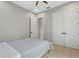 Bedroom featuring neutral walls, hardwood floors, and a closet at 14166 Fort Worth Cir, Port Charlotte, FL 33981