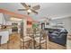 Open-concept living area featuring a dining space, a full kitchen, and a comfortable living room at 1478 Harmony Dr, Port Charlotte, FL 33952