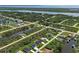 This waterfront neighborhood features mature landscaping, direct canal access, and beautifully maintained homes at 15741 Autry Cir, Port Charlotte, FL 33981