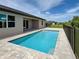 Private pool area with ample space for relaxation at 15741 Autry Cir, Port Charlotte, FL 33981