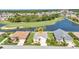 Aerial view of the home overlooking the lake and golf course at 1617 Britannia Blvd, Punta Gorda, FL 33980