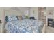 Bright bedroom with nautical decor, large windows, and a view of the lake at 1617 Britannia Blvd, Punta Gorda, FL 33980