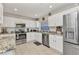 Well lit eat-in kitchen with stainless steel appliances and beautiful granite countertops at 1617 Britannia Blvd, Punta Gorda, FL 33980