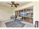 Enclosed lanai with patio furniture and sliding glass doors leading to the living room at 1617 Britannia Blvd, Punta Gorda, FL 33980