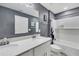 Bathroom with a double sink vanity and combined shower and tub at 16833 Terrapin Key Dr, Port Charlotte, FL 33953