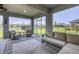 Comfortable covered patio with ample seating, perfect for outdoor relaxation and entertaining at 16833 Terrapin Key Dr, Port Charlotte, FL 33953