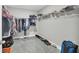 Spacious walk-in closet featuring ample storage with shelving and hanging racks at 16833 Terrapin Key Dr, Port Charlotte, FL 33953