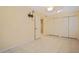 Bedroom with tile flooring, ceiling fan, closet and TV mount at 180 Palmetto Ne Cir, Port Charlotte, FL 33952