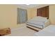 Cozy bedroom with a daybed, tile floor and natural light at 180 Palmetto Ne Cir, Port Charlotte, FL 33952