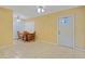 Dining area features tile flooring, ceiling fan and lots of light at 180 Palmetto Ne Cir, Port Charlotte, FL 33952