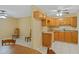 Kitchen offers wood cabinets and laminate countertops at 180 Palmetto Ne Cir, Port Charlotte, FL 33952