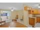 Open layout kitchen, adjoining dining and an additional room at 180 Palmetto Ne Cir, Port Charlotte, FL 33952