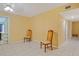 Bright and spacious living room with tile flooring at 180 Palmetto Ne Cir, Port Charlotte, FL 33952